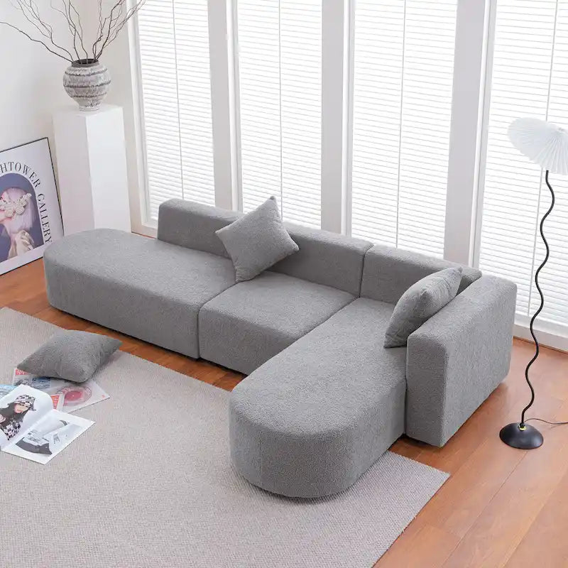Canapé d'angle moderne en bouclette avec assise incurvée (côté droit)