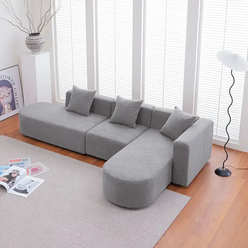 Canapé d'angle moderne en bouclette avec assise incurvée (côté droit)