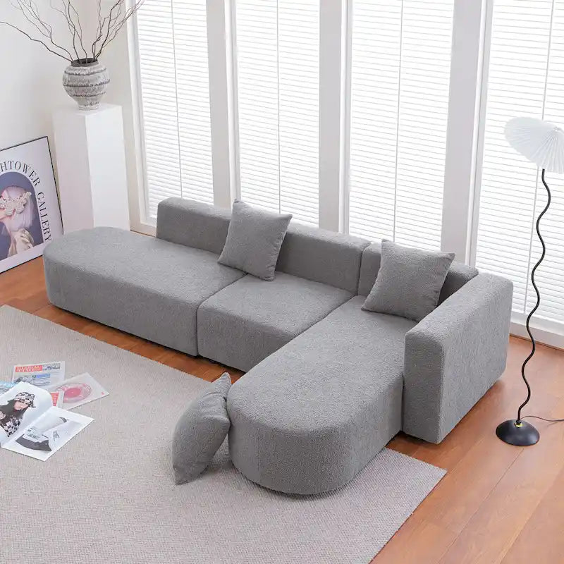 Canapé d'angle moderne en bouclette avec assise incurvée (côté droit)
