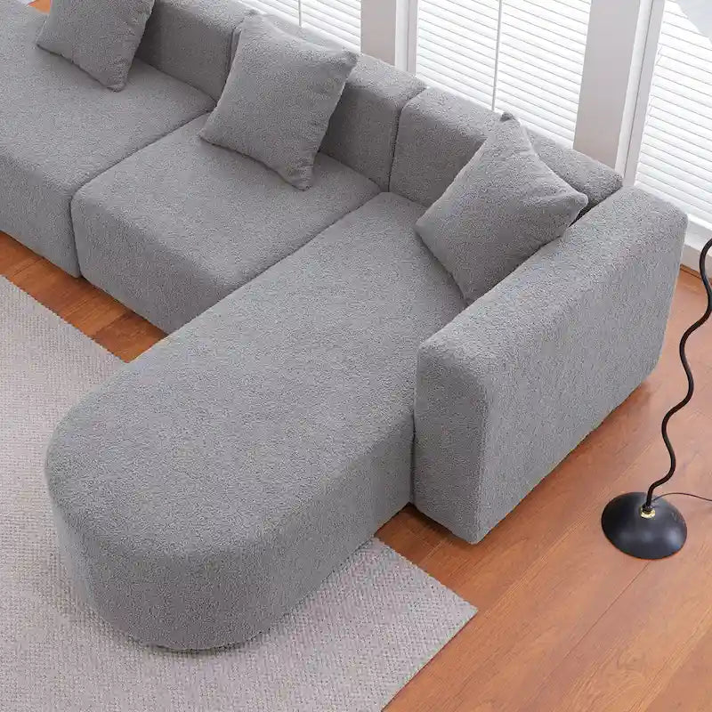 Canapé d'angle moderne en bouclette avec assise incurvée (côté droit)
