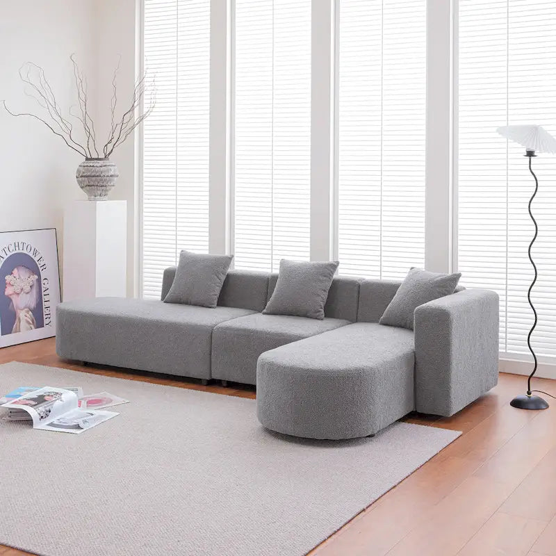 Canapé d'angle moderne en bouclette avec assise incurvée (côté droit)