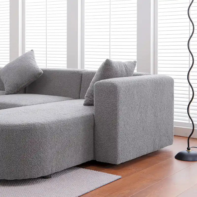 Canapé d'angle moderne en bouclette avec assise incurvée (côté droit)